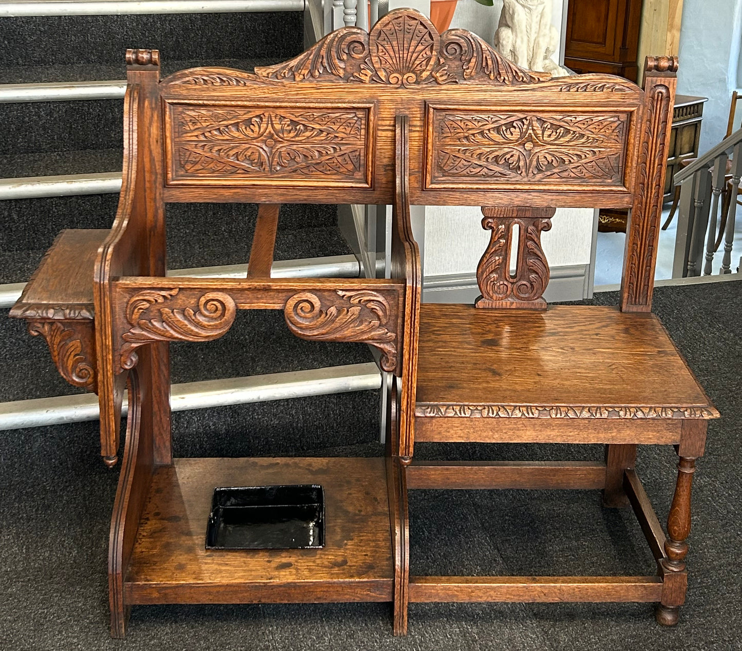 Carved oak hall seat/stick stand