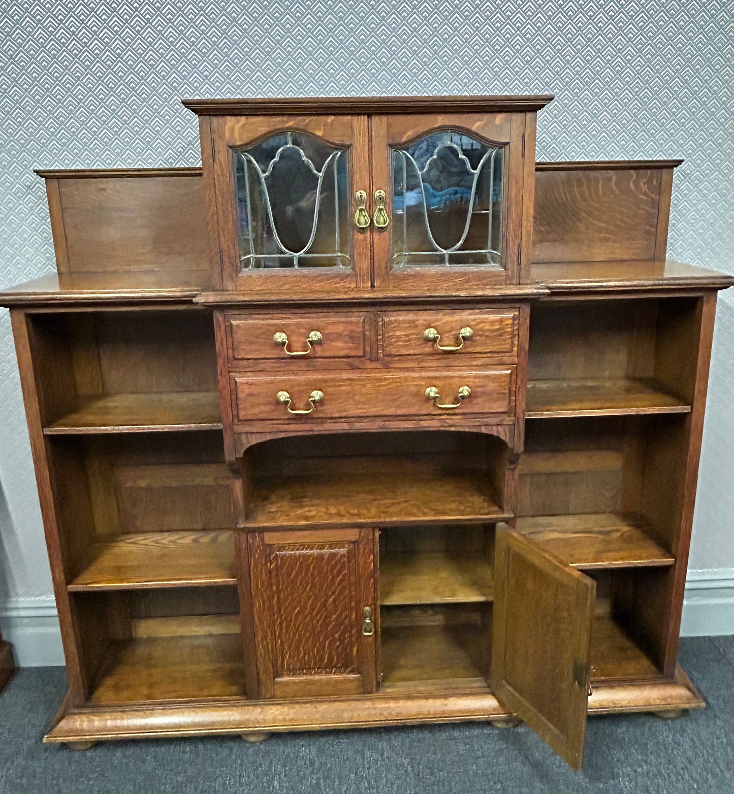 Oak bookcase cupboard by Shapland and Petter