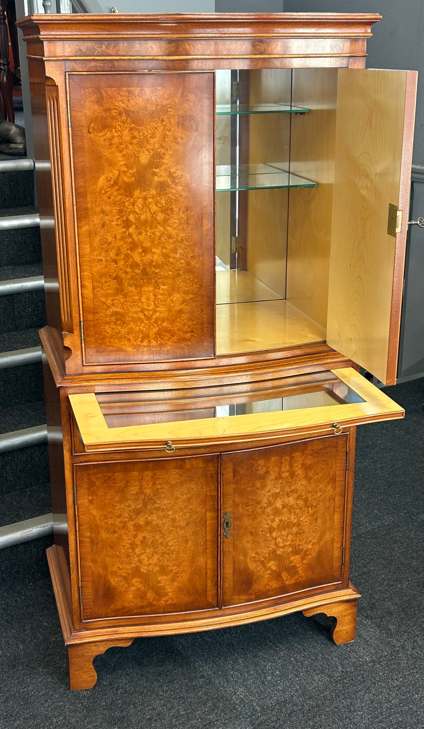 A Bevan Funnell Reprodux Burr Walnut Dinks Cabinet