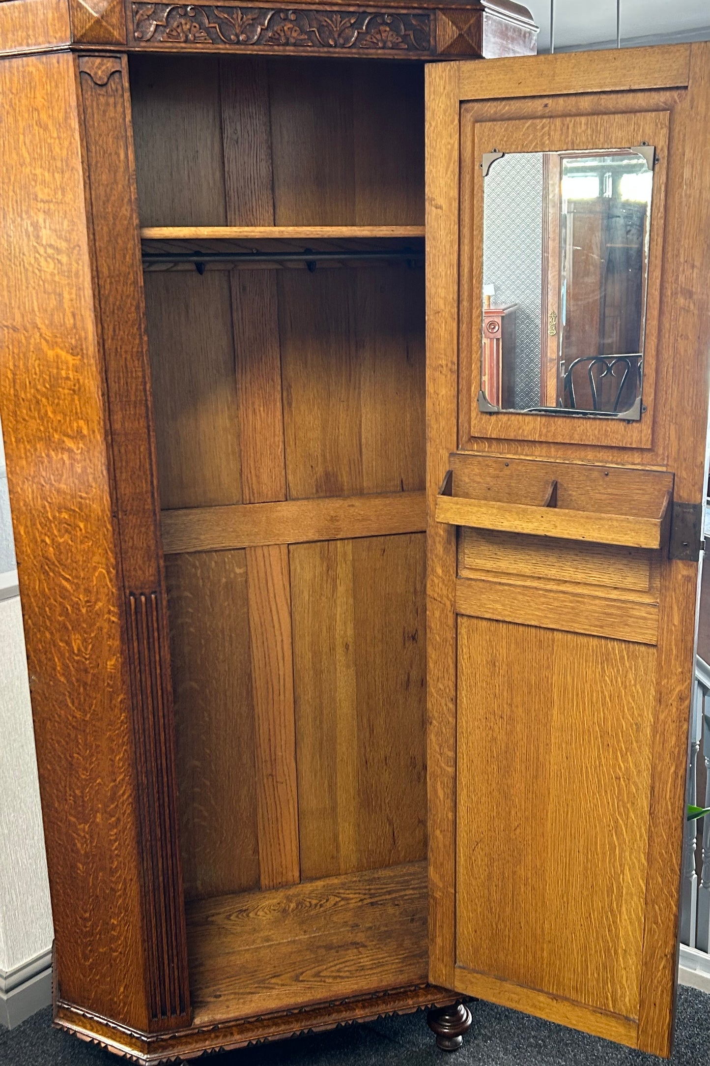 Solid oak 1920s hall robe with linen fold door