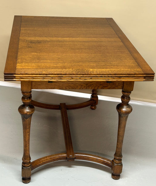 Extending Oak drawer leaf dining table