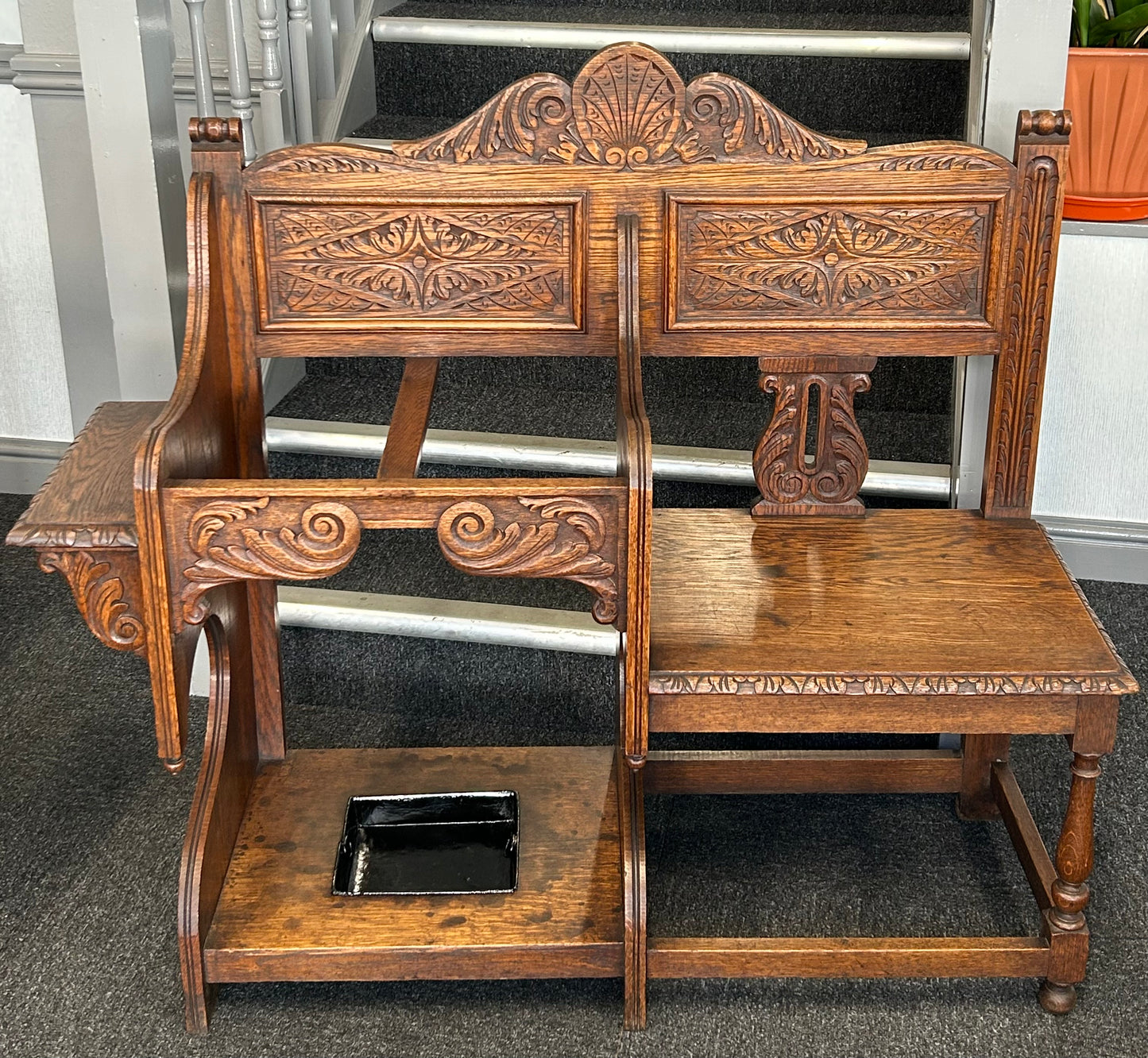 Carved oak hall seat/stick stand