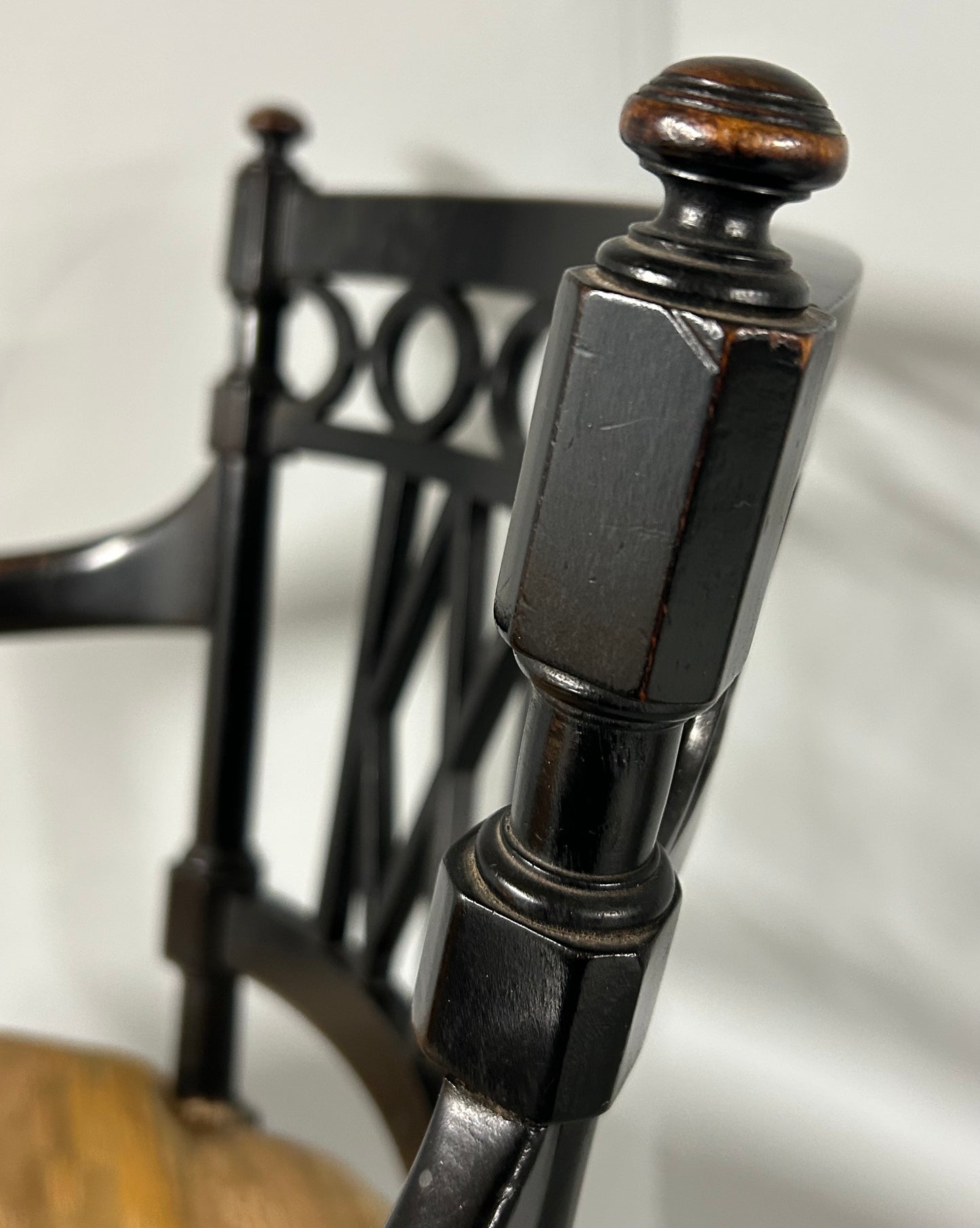 Collier and Plucknett ebonised aesthetic movement armchair.