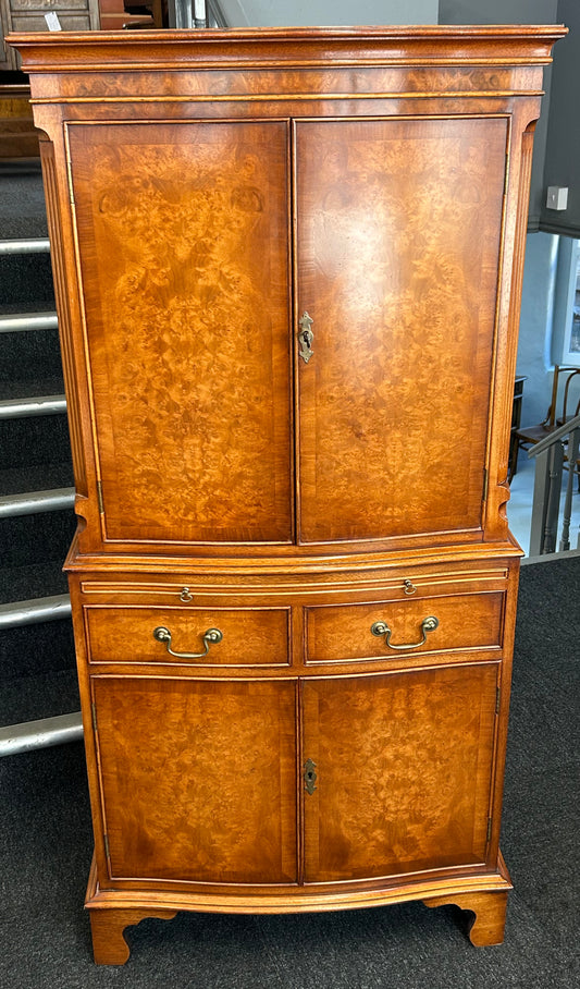 A Bevan Funnell Reprodux Burr Walnut Dinks Cabinet