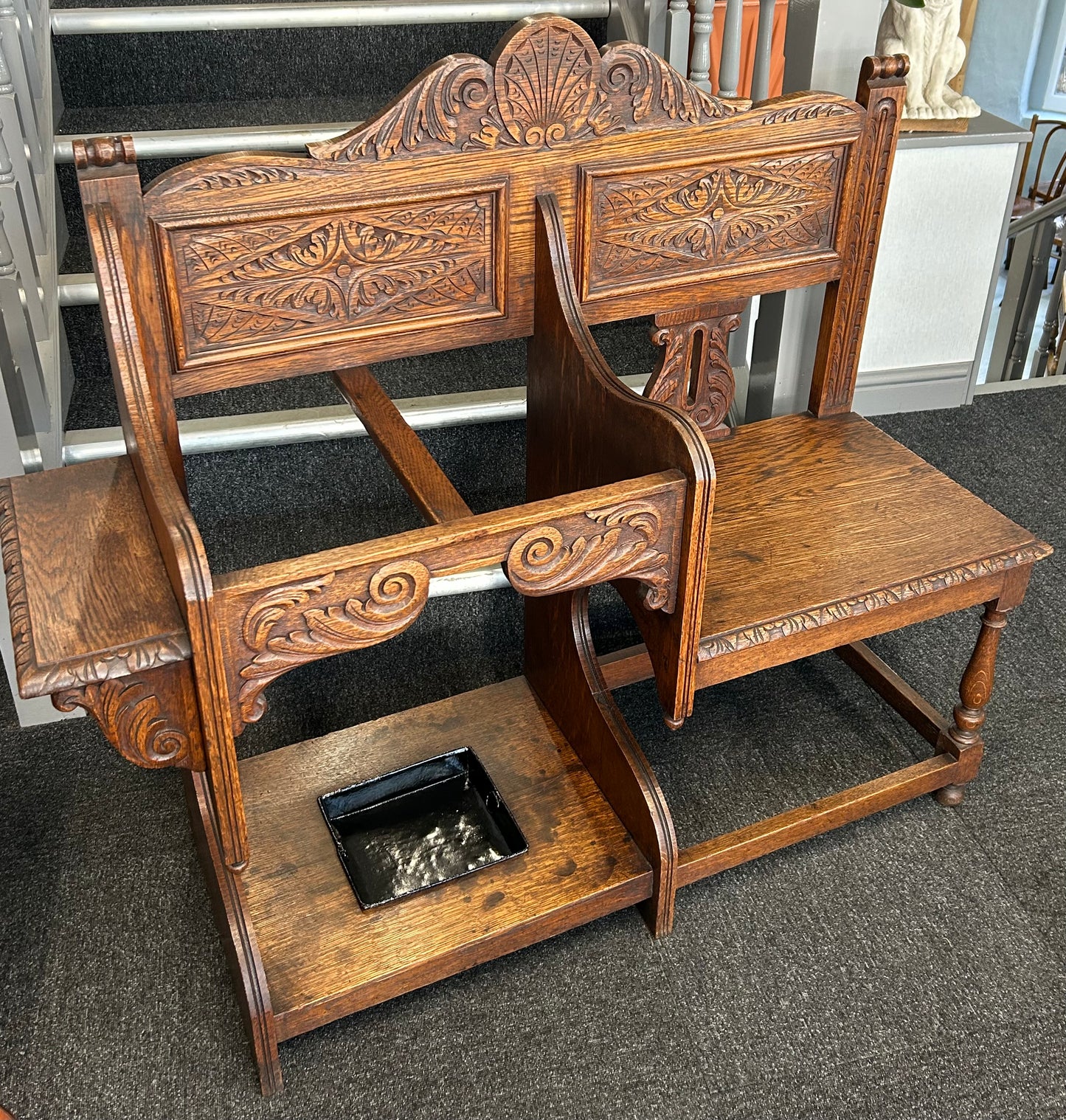 Carved oak hall seat/stick stand