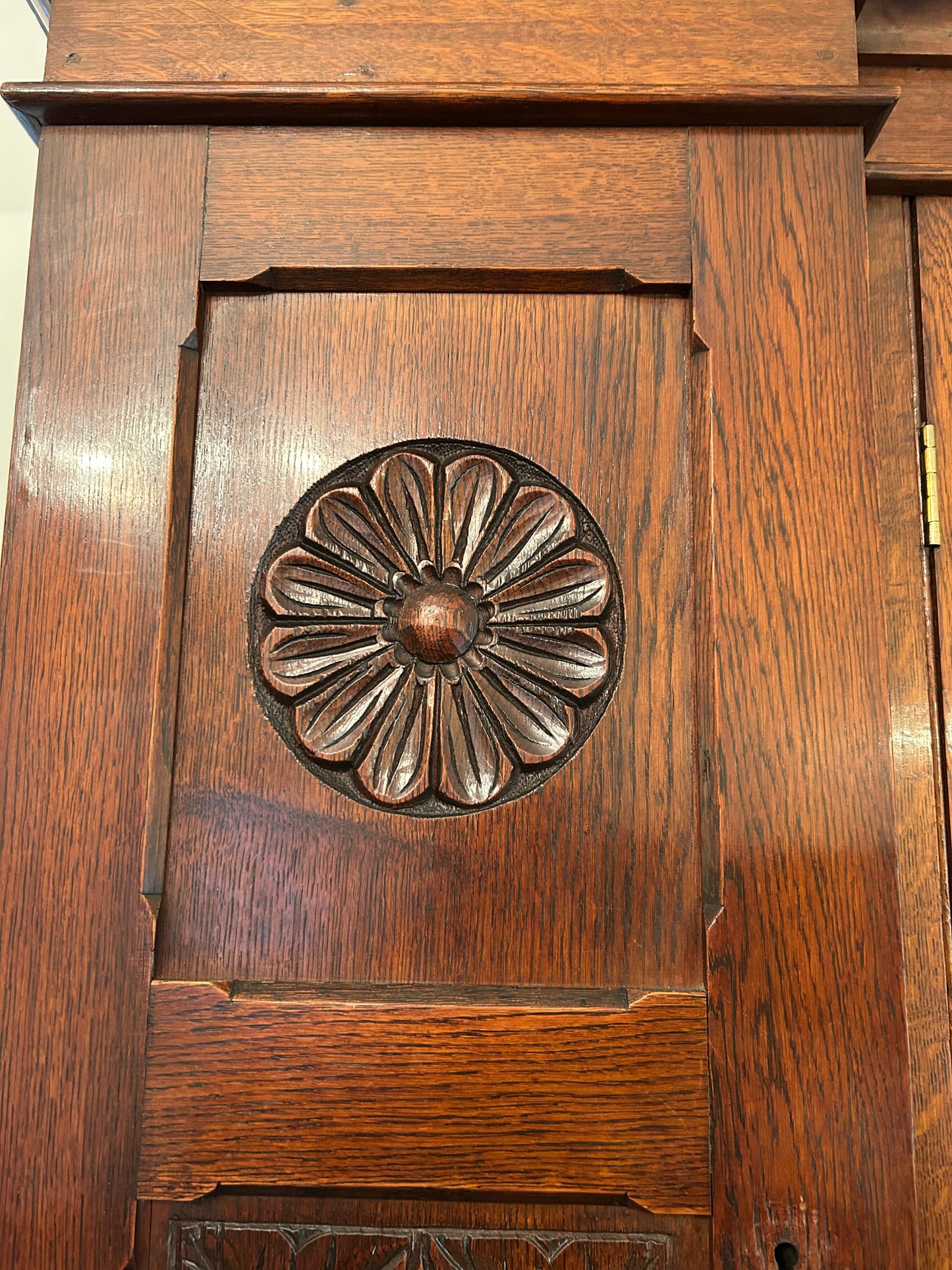 Large oak bookcase on carved cupboard base