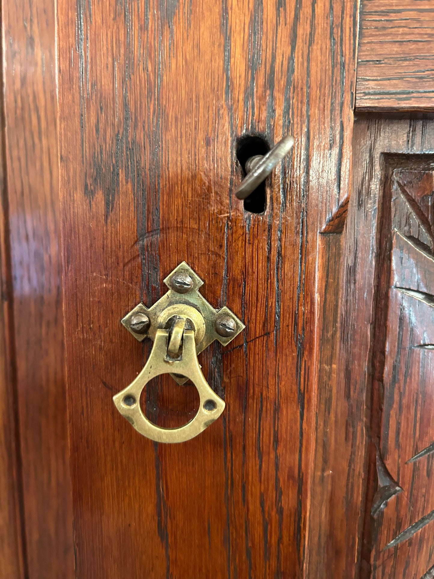 Large oak bookcase on carved cupboard base