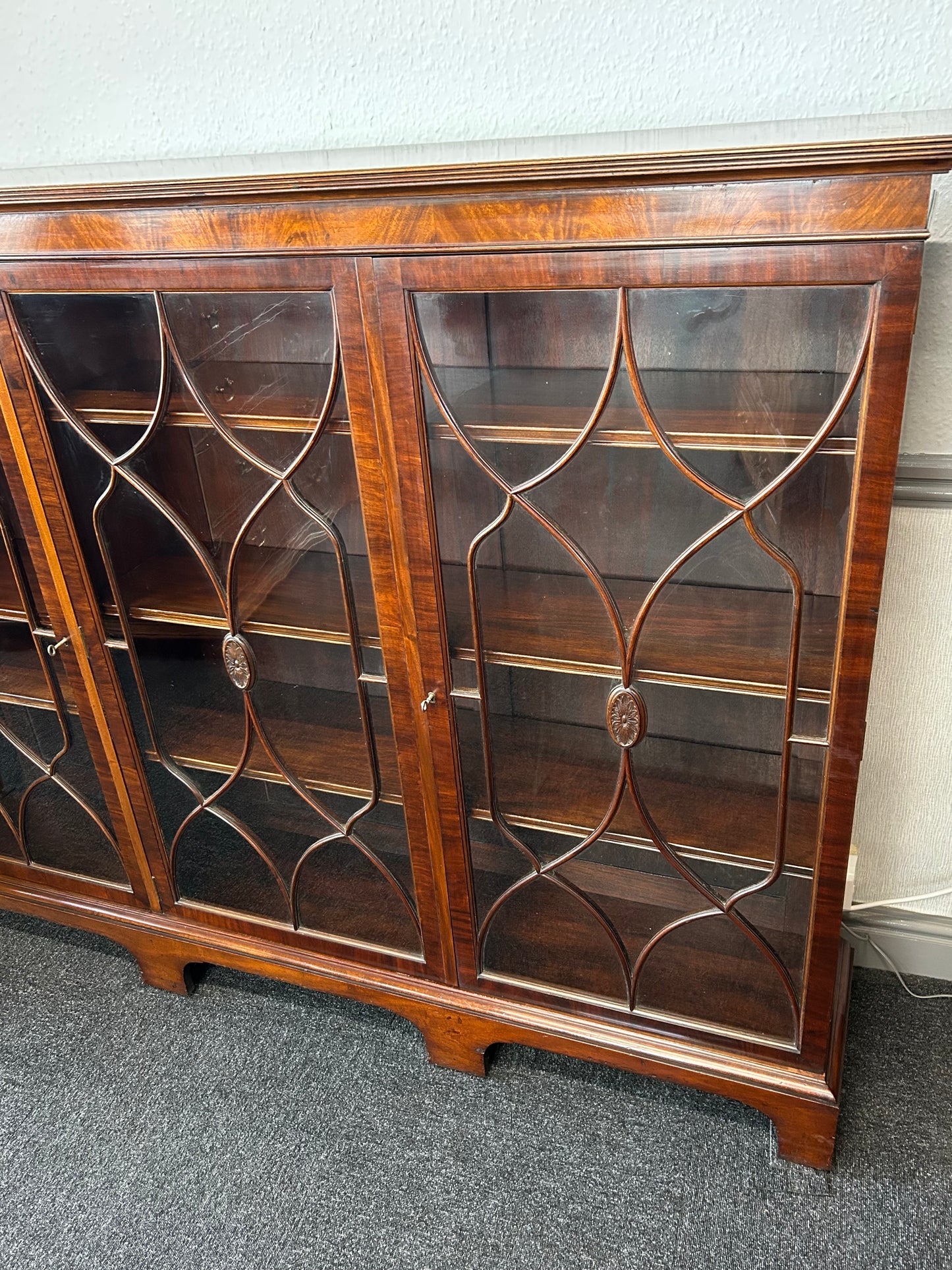 Mahogany 3 door glazed bookcase by Wylie and Lochhead