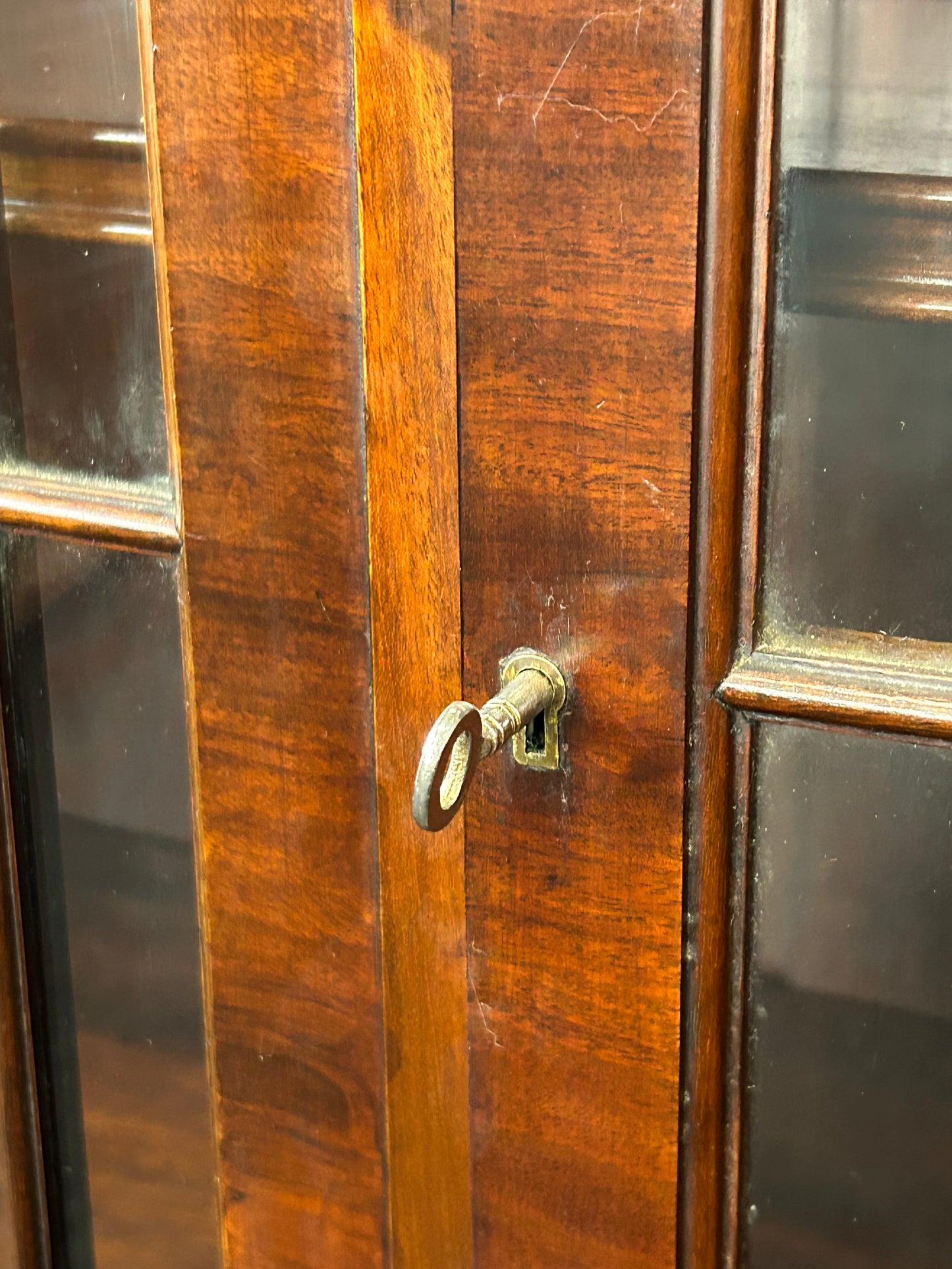 Mahogany 3 door glazed bookcase by Wylie and Lochhead