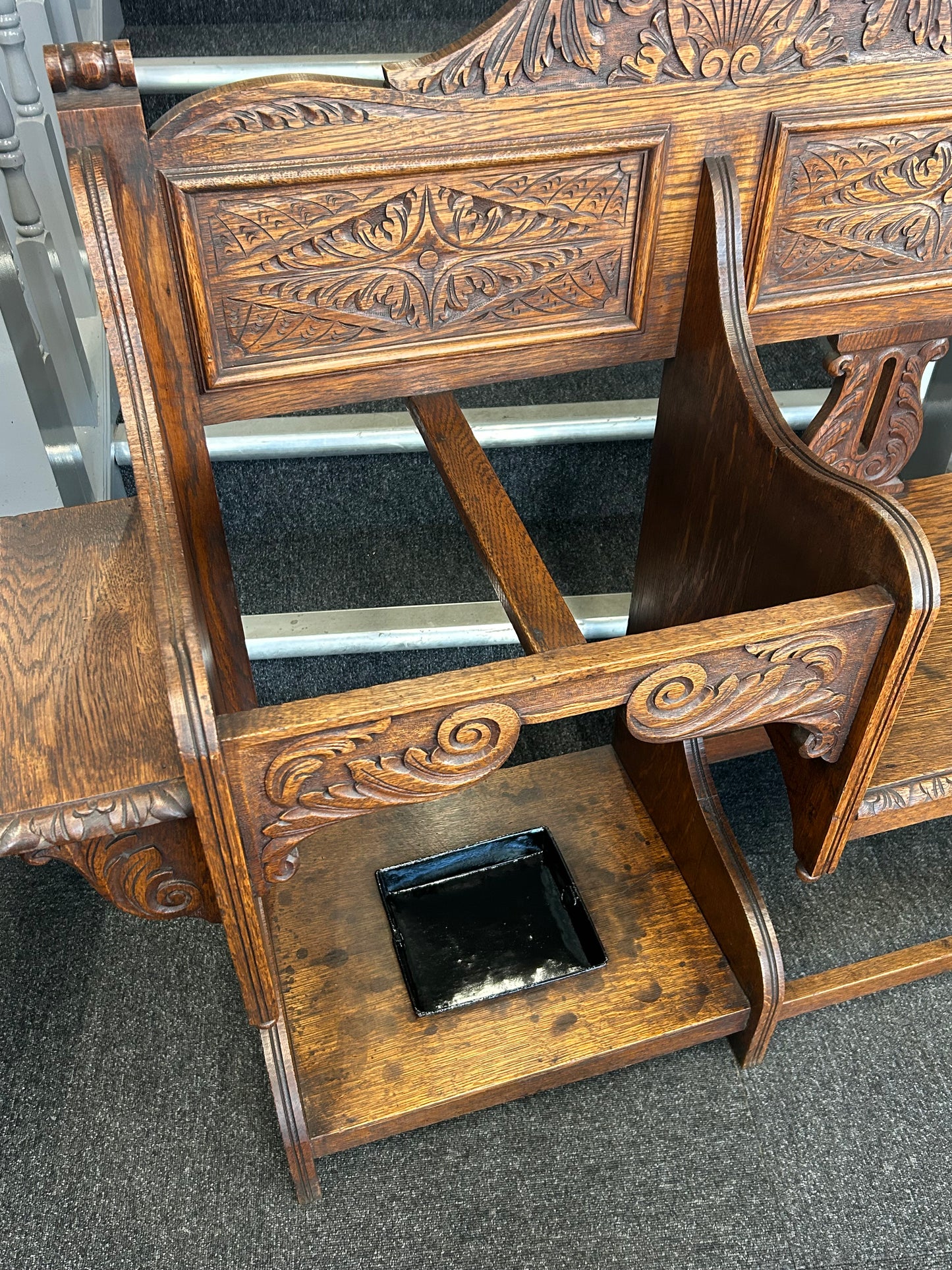 Carved oak hall seat/stick stand