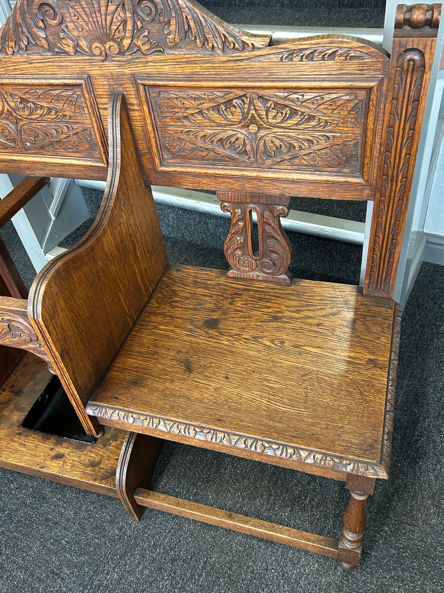 Carved oak hall seat/stick stand